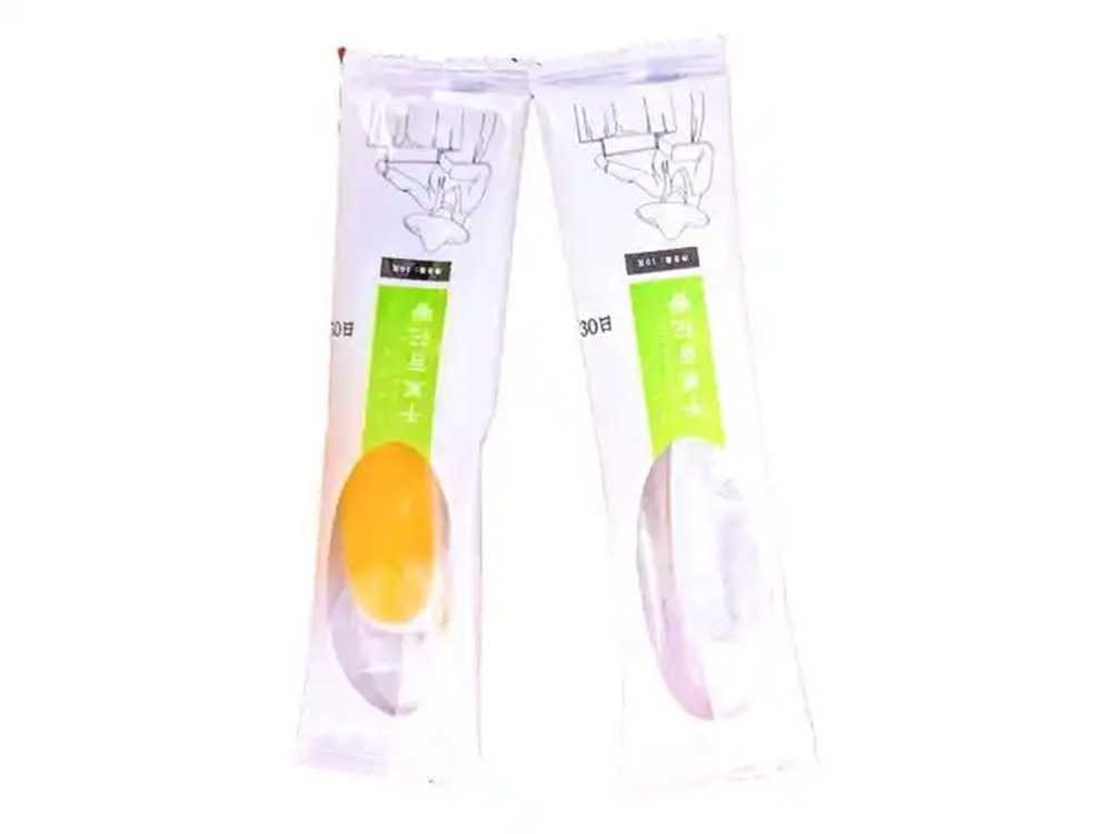 呂工機械全自動勺子灌裝封口機——解決蜂蜜、膏方、秋梨膏等高黏物料包裝難題